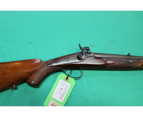 A percussion sporting rifle of approx .58 cal, with working lock, patch box and rod in place