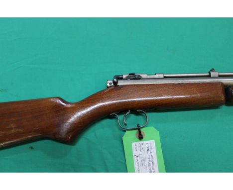 A rare boxed Benjamin Franklin model 312 'pump' pneumatic .22 cal air rifle with original paper instructions etc, as a post 1