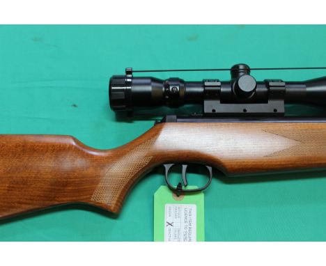 A Hammerli Seeker 800 .22 cal break barrel air rifle, complete with sound moderator and B.S.A. scope, in overall excellent co