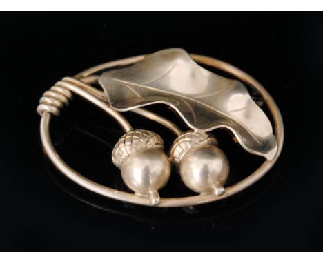 Alphonse La Paglia for Georg Jensen - A 1940s American Sterling silver openwork brooch decorated with two acorns and an oak l