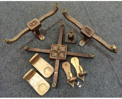 Unknown - A quantity of Arts and Crafts oak light fittings with foliate, rosette and stylised seed pod carved detail. (Qty)