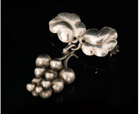 Harald Nielsen for Georg Jensen - A Danish Sterling silver brooch  'Moonlight Grapes', number 217A, designed as a pair of vin