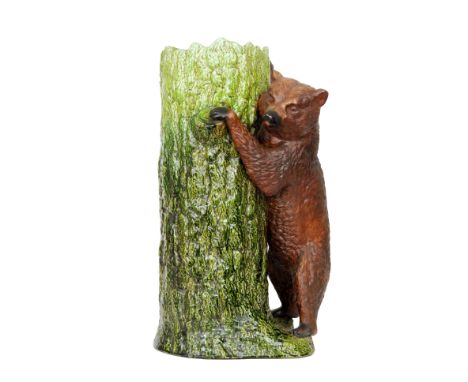 Bretby - A large late 19th Century stick stand modelled as a rustic tree trunk with a standing brown bear cub to the side, im