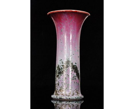 Ruskin Pottery - A high fired lily vase decorated in a sweeping tonal purple glaze with deep red to the rim edge and green co