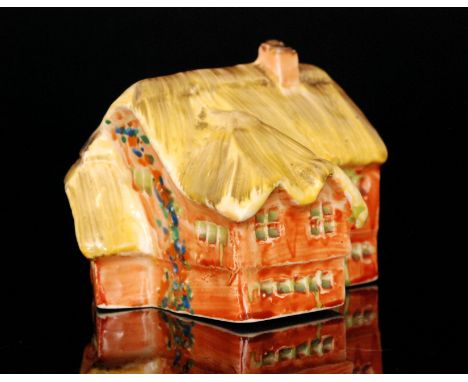 Clarice Cliff - Manor House - A small novelty model of a thatched Manor style house picked out in enamel colours, Bizarre mar