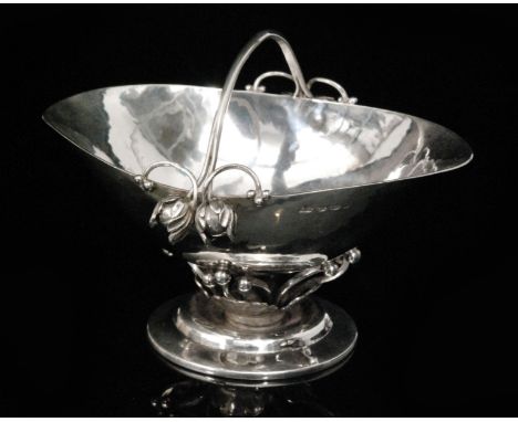 Georg Jensen - A 1920s Danish sterling silver sugar or candy basket, model 235A, designed in 1917, the ovoid lipped basket su