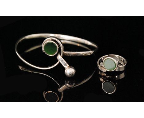 Alton -  A 1970s Swedish Sterling silver bangle and matching ring, of modernist design, the bangle with swirling scroll head 