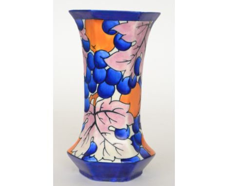 Charlotte Rhead - Burleigh Ware - A 1930s Art Deco vase of hexagonal globe and shaft form decorated with oranges and blue ber