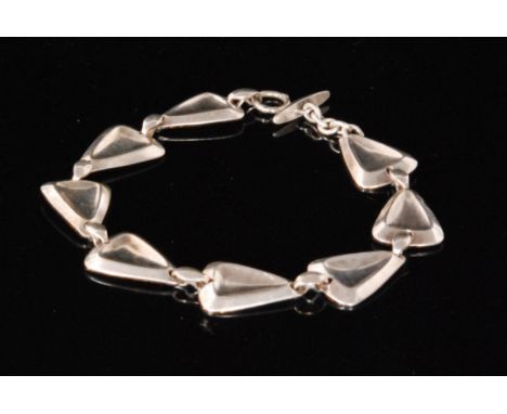 Herman Siersbol - Kastrup - A Danish Sterling silver link bracelet formed of eight stylised triangular shaped panels joined b