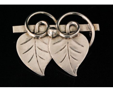 Alphonse La Paglia for Georg Jensen - A 1940s American Sterling silver openwork brooch decorated with twin overlapping stylis