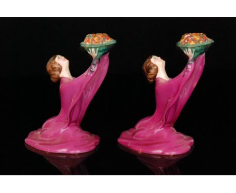 Clarice Cliff - Lady Candlestick - A pair of candlesticks circa 1926 modelled as ladies in flowing robes holding aloft a bowl