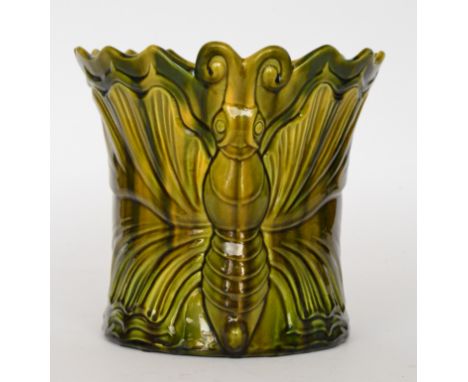 Attributed to Christopher Dresser - Ault Pottery - A green glazed jardiniere decorated with a relief moulded moth with its wi