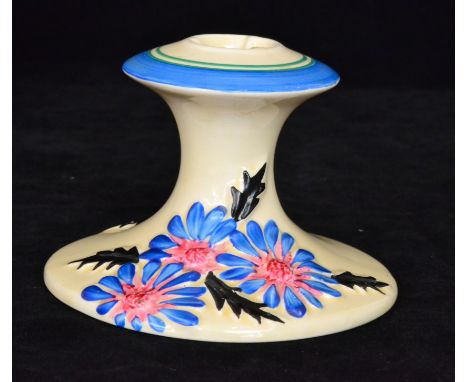 Clarice Cliff - Marguerite - A shape 310 candlestick circa 1933 relief moulded with stylised flowers and foliage picked out i