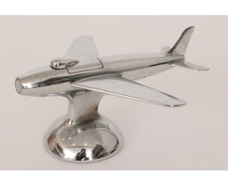 Dunhill - A chromed table cigarette lighter, introduced in 1954, modelled after the Sabre F-86 jet plane, height 8cm, length 