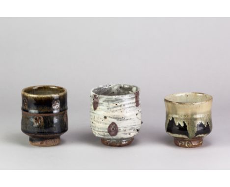 JIM MALONE (born 1946); three stoneware yunomi covered in various glazes, impressed JM and B (for Burnby) marks, tallest 10cm