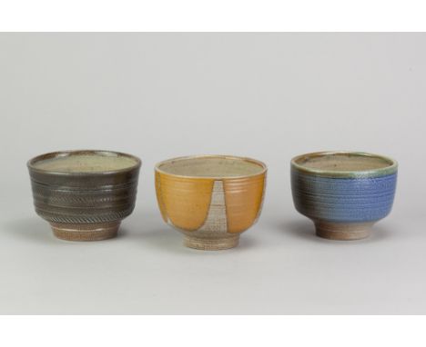 RAY FINCH (1914-2012) for Winchcombe Pottery; three salt glazed tea bowls, impressed WP. marks, largest diameter 11cm (3). (D