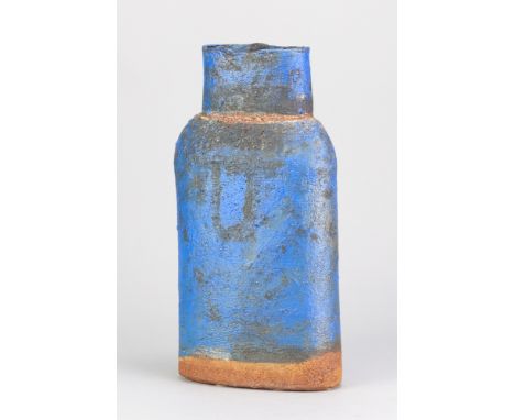 ROBIN WELCH (1936-2019); a stoneware oval bottle form with textured surface covered in blue glaze, impressed RW mark, height 