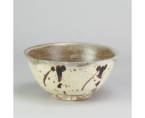 JIM MALONE (born 1946); a stoneware bowl covered in brushed slip with iron decoration, impressed JM and A (for Ainstable) mar