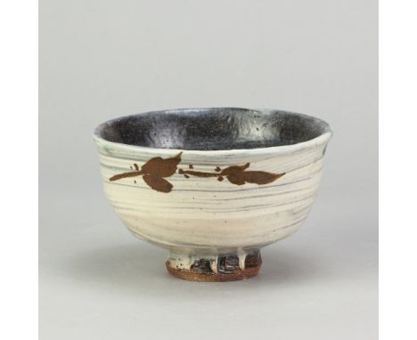 JIM MALONE (born 1946); a stoneware chawan covered in brushed slip with iron and copper green decoration, impressed JM and L 