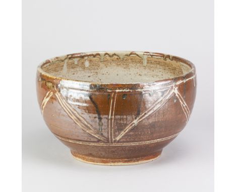 MICHAEL LEACH (1913-1985) for Yelland Pottery; a stoneware rose bowl covered in kaki glaze with linear decoration, impressed 