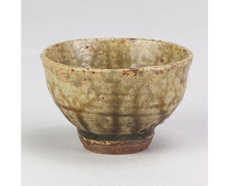 JANET LEACH (1918-1997) for Leach Pottery; a stoneware cup covered in green ash glaze, impressed JL and pottery marks, diamet