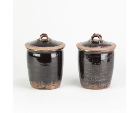 RICHARD BATTERHAM (1936-2021); a pair of stoneware caddies covered in tenmoku breaking to kaki glaze, impressed early RB mark