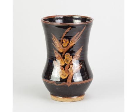 DAVID LEACH (1911-2005) for Lowerdown Pottery; a stoneware vase covered in tenmoku breaking to kaki glaze with wax resist dec