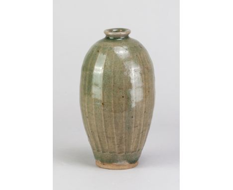 KATHARINE PLEYDELL-BOUVERIE (1895-1985); a stoneware lightly faceted bottle covered in green ash glaze, painted code number, 