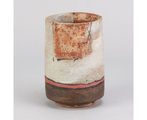 ROBIN WELCH (1936-2019); a stoneware cylindrical vessel with bands of white, salmon pink and bronze glaze with mottled dark p