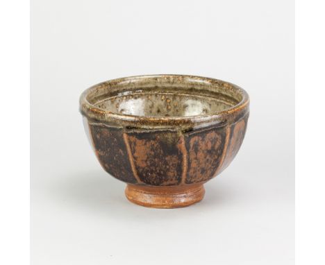 RICHARD BATTERHAM (1936-2021); a stoneware cut sided bowl covered in tenmoku breaking to kaki and green ash glaze, diameter 1