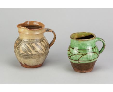 MICHAEL CARDEW (1901-1983) for Winchcombe Pottery; a slipware mug partially covered in galena glaze with iron decoration, imp