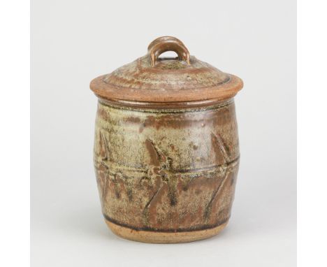 RICHARD BATTERHAM (1936-2021); a stoneware jar and cover covered in green ash and iron glaze, height 17.5cm. (D)Additional In