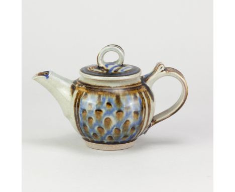 NIC HARRISON (born 1949); a stoneware teapot decorated with iron and cobalt on pale grey ground, impressed NH mark, height 13