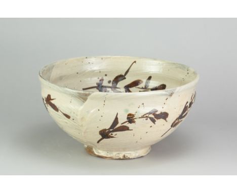 JIM MALONE (born 1946); a large stoneware bowl covered in brushed slip with iron and copper green decoration, impressed JM an