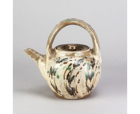 JIM MALONE (born 1946); a stoneware teapot with loop handle covered in brushed slip with iron, cobalt and copper green decora