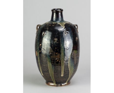 JIM MALONE (born 1946); a stoneware lugged bottle covered in tenmoku breaking to kaki glaze with copper green pours, impresse