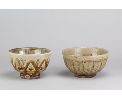 JIM MALONE (born 1946); a stoneware chawan covered in green ash glaze with incised decoration, impressed JM and A (for Ainsta