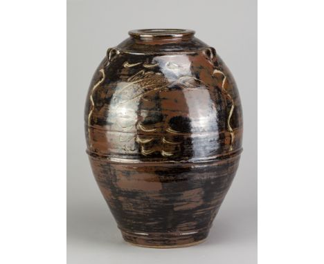 JIM MALONE (born 1946); a large stoneware lugged jar covered in red slip with incised fish decoration, impressed JM and B (fo