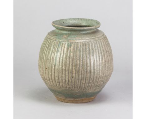 KATHARINE PLEYDELL-BOUVERIE (1895-1985); a stoneware fluted vase covered in pale green ash glaze, impressed KPB mark and pain