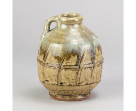 MIKE DODD (born 1943); a stoneware flask covered in green ash glaze with incised decoration and nuka top, impressed MJD mark,