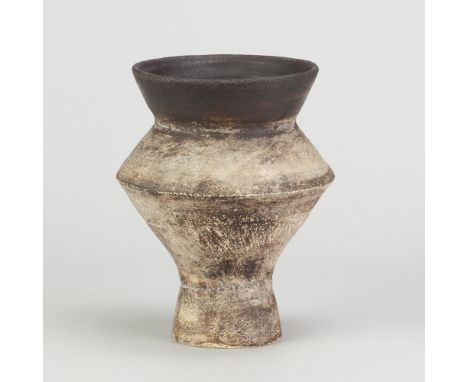 HANS COPER (1920-1981); a stoneware angular vessel covered in white slip over textured manganese ground with manganese flared