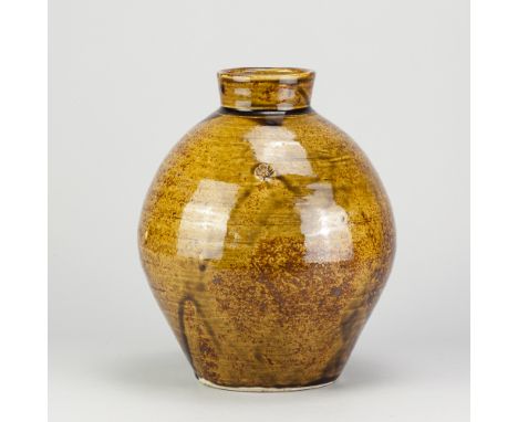 WILLIAM MARSHALL (1923-2007) for Leach Pottery; a porcelain bottle covered mottled iron and green ash glaze with impressed de