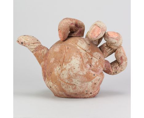 JILL CROWLEY (born 1946); a stoneware teapot in the form of a hand covered in dry pink glaze with incised decoration, incised
