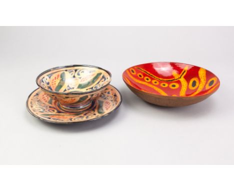 SOPHIE McCARTHY (born 1956); an earthenware cup and saucer with wax resist decoration, incised signatures, saucer diameter 18