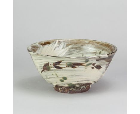 JIM MALONE (born 1946); a stoneware bowl covered in brushed slip with iron and copper green decoration, impressed JM and B (f