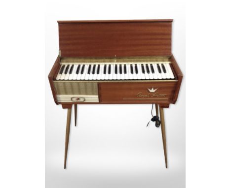 A vintage Royal Artist teak-cased piano accordion on tapered legs, Made in Italy, width 63cm.