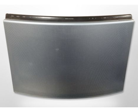 A Bang & Olufsen Beosound 1 curved speaker type 2581, with lead (continental plug).
