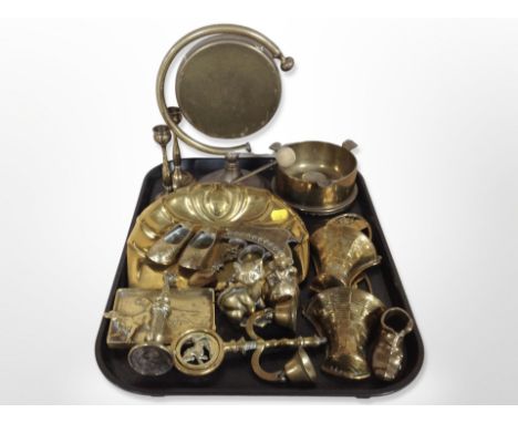 Brass wares including gong and beater, pair of wall pockets, candlesticks, vintage steel corkscrew, etc.