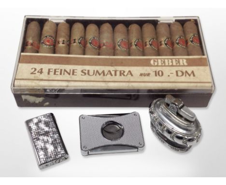 A pack of 24 Geber Feine Sumatra cigars, together with a Kingsway Juno lighter, a table lighter and a stainless steel cigar c