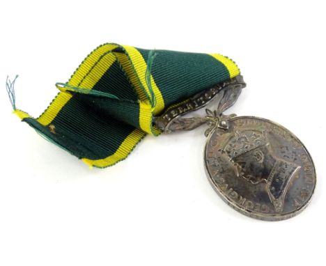 A George VI Territorial Army Efficient Service medal, awarded to a 1430638 Rifleman R.B.B. Walker, Royal Berkshire.